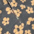 Macro view of soft grey fleece hoodie showing yellow floral pattern and metal zipper closure - S / Tops / Grey Purple with Yellow Floral