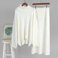 Cream-white knit set displayed on hangers against a grey wall with minimalist home decor - S / Top And Bottom / Off White