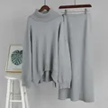 Detailed view of grey oversized turtleneck sweater and matching knit midi skirt set - S / Top And Bottom / Gray