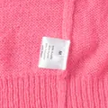 Detailaufnahme des Materialetiketts einer pinkfarbenen, bonbonfarbenen Strickjacke aus Strick - S / Oberteile / Fuchsia