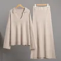 Elegant beige knitted two-piece set featuring a V-neck sweater and a long maxi skirt - S / Top And Bottom / Camel