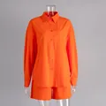 Leuchtend oranges Baumwoll-Set mit Langarmshirt und Shorts für sommerliche Freizeitmode - S / Oberteil Und Unterteil / Orange
