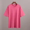 Detailansicht eines pinkfarbenen Acid-Wash-Vintage-Oversize-Baumwoll-T-Shirts - S / Oberteile / Fuchsia