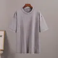 Minimalist washed vintage oversized grey cotton T-shirt featuring soft acid wash texture - Light Gray