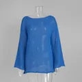 Detailed texture of blue hollow-out knit sweater with elegant flare sleeves and sheer fabric. - S / Tops / Sapphire Blue