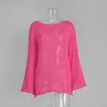 Close-up view of a pink hollow-out knit top with stylish flared sleeves on a mannequin - S / Tops / Rose Red