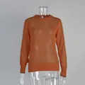 Detailed texture view of orange semi-transparent mohair knit sweater for women - S / Tops / Orange