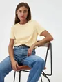 Lässiges hellgelbes Damen T-Shirt mit Rundhalsausschnitt für den täglichen Sommer - Aprikose