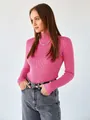 Close-up of pink ribbed mock-neck sweater showing its slim fit and knit texture - One Size / Tops / Rose Red