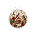 Christmas ornament featuring a snowy cottage and street lamp with festive details. - Christmas Cottage / 1 Piece