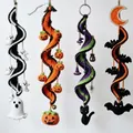 Detail view of four Halloween crochet spiral decorations with ghost and pumpkin motifs - Ghost Style