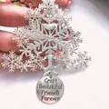 Detailed macro view of silver Christmas tree ornament with engraved friendship message pendant - Christmas Tree / Silver