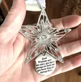 Close-up detail of silver star ornament with rhinestones and engraved friendship quote tag - Pentagram / Silver