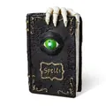 Detail view of Halloween resin spell book with skeletal hand and glowing green eye - Skeleton Spells Book
