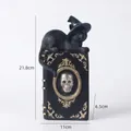 Halloween wizard cat sitting on magic book resin decor showing product dimensions - Wizard Cat Magic Book