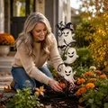 Solar-powered Halloween ghost garden stake light featuring glowing ghosts and pumpkin - Solar Ghost Stake Light