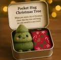 Detailed view of a handmade felt Christmas tree gift in a decorative tin box. - Christmas Tree