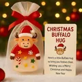 Detail showing a cute Buffalo Hug Christmas ornament in a mesh gift bag with card - Style A Buffalo