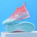 Detailed view of pink and blue high-top soccer cleats featuring TF studded turf outsoles - 38 / Pink Turf Soccer Shoes (268) / Pink
