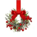 Christmas wreath with large red bow, pine needles, red berries and pine cones. - Christmas Wreath Red Bow Style