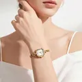 Elegante achteckige goldene Damenuhr mit feinem Mesh-Armband und minimalistischem Zifferblatt - Goldenes Gehäuse Goldene Indizes Weißes Zifferblatt Goldenes Armband