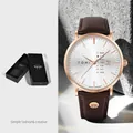 TOMI minimalistische kreative Quarzuhr mit braunem Lederarmband und Datumsanzeige - Roségoldenes Gehäuse Weißes Zifferblatt Braunes Lederarmband (T019-6)