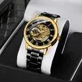 Reloj mecánico esqueleto Forsining para hombre con bisel dorado y correa de acero negro. - Caja Dorada Esfera Negra Correa de Acero Negra (FSG8099)