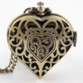 Reloj de bolsillo vintage de bronce con forma de corazón hueco para mujeres y niñas - Bronce antiguo