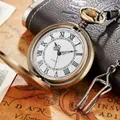 Macro view of a classic vintage bronze pocket watch with Roman numeral dial on a map. - Bronze