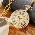 Close-up of vintage gold quartz pocket watch with Roman numerals and elegant chain - Gold