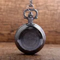 Detail shot of a vintage gunmetal pocket watch with a blank center for DIY stickers. - Black