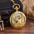 Close-up of gold semi-automatic mechanical pocket watch with hollow deer head design. - Gold