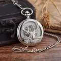 Close-up of silver mechanical pocket watch featuring a detailed embossed buck head design. - Silver