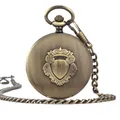 Vintage bronze automatic mechanical pocket watch with textured shield flip cover and chain. - Vintage Bronze Shield Relief (PM041)