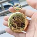 Detailed macro view of a golden vintage hollow gear automatic mechanical pocket watch. - Gold