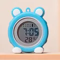 Close-up of a blue silicone cartoon nurse watch with large digital display and week indicator - Lake Blue