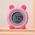 Detail view of pink cartoon silicone nurse watch with clear digital LCD screen - Pink