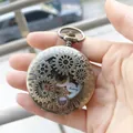 Detailed macro view of vintage mechanical pocket watch with bronze gear design - Bronze