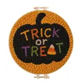 Detailed view of Halloween pumpkin punch needle embroidery with "Trick or Treat" text. - Trick Or Treat Pumpkin (Style I)