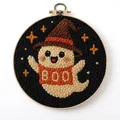 Detailed close-up of a handmade Halloween ghost punch needle embroidery in a wooden hoop - Boo Wizard Hat Ghost (Style K)