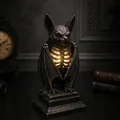 Detailed macro view of a gothic bat skeleton resin lamp for Halloween decor - Bat Skeleton Lamp