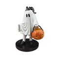 Detail of Halloween ghost figurine holding a pumpkin bucket with a black cat on its head - White Ghost Pumpkin