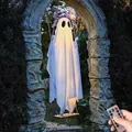 Detailed view of large glowing white ghost on a swing for Halloween garden decor - Glowing Swing Ghost