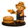 Detailansicht eines Halloween-Teelichthalters mit niedlicher Vogelscheuchenfigur - Vogelscheuche-Lagerfeuer / Kerzenhalter