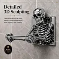 Polished chrome skeleton toilet paper holder featuring a detailed 3D anatomical sculpture - Skull Pattern / Silver
