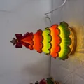 Decorative colorful tiered Christmas tree light ornament with red bow for holiday decor - Christmas Tree Night Light