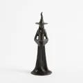 Handmade black resin witch figurine with pointed hat for spooky Halloween home decor - Witch Candle Holder Style A