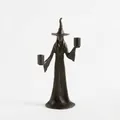 Detailed view of a handmade black witch statue Halloween resin ornament for shelf decor - Witch Candle Holder Style B