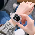 Detailed view of the square LED digital watch worn on a wrist showing clear screen - Clear White