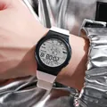 Detailed view of a digital sports watch with astronaut motif and white silicone strap. - Round (955 Astronaut) / White